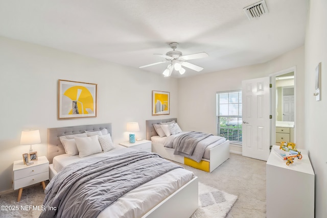 13022 Huntley Manor Dr, Jacksonville, FL 32224 - bedroom featuring light colored carpet and a ceiling fan
