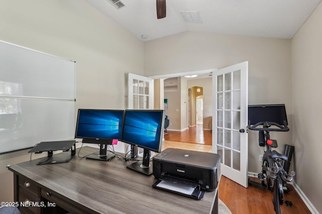 1346 N Kyle Way, Jacksonville, FL 32259 - home office with arched walkways, a ceiling fan, french doors, wood finished floors, and lofted ceiling