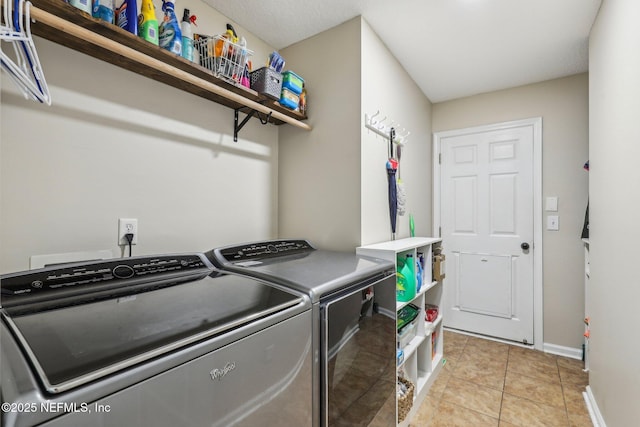 1346 N Kyle Way, Jacksonville, FL 32259 - laundry room featuring separate washer and dryer, light tile patterned flooring, and baseboards