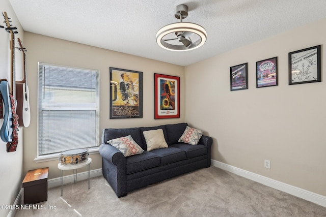 1346 N Kyle Way, Jacksonville, FL 32259 - living area featuring carpet floors, baseboards, a textured ceiling, and a ceiling fan