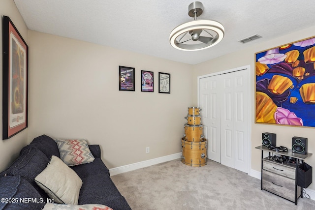 1346 N Kyle Way, Jacksonville, FL 32259 - living area featuring carpet flooring, baseboards, and a textured ceiling