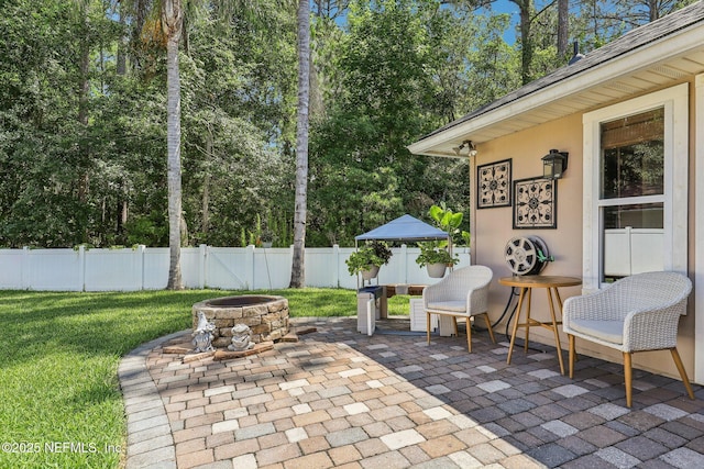 1346 N Kyle Way, Jacksonville, FL 32259 - view of patio / terrace featuring a fire pit and view of scattered trees