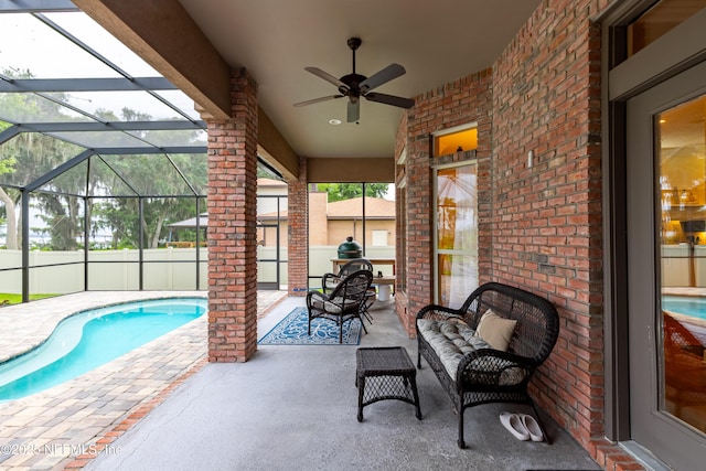 6449 Jack Wright Island Rd, Saint Augustine, FL 32092 - view of swimming pool featuring a patio area, a ceiling fan, and glass enclosure
