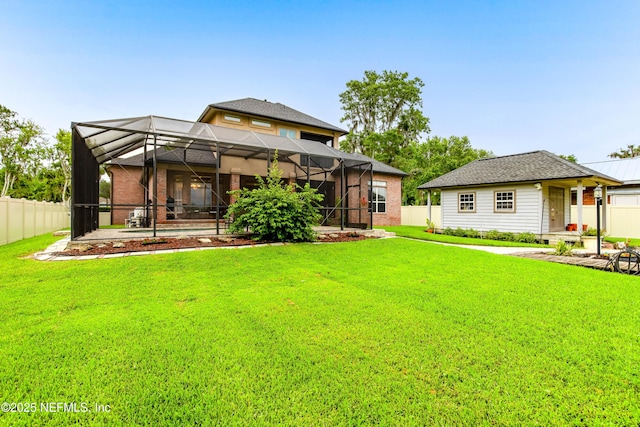 6449 Jack Wright Island Rd, Saint Augustine, FL 32092 - back of property featuring brick siding and a lanai