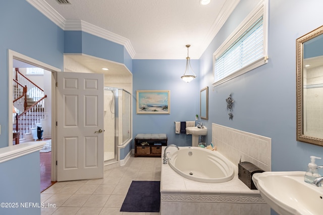 6449 Jack Wright Island Rd, Saint Augustine, FL 32092 - full bathroom with a stall shower, a jetted tub, ornamental molding, tile patterned flooring, and a sink