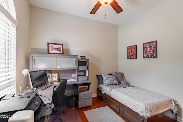 6449 Jack Wright Island Rd, Saint Augustine, FL 32092 - bedroom with dark wood finished floors, a desk, and a ceiling fan