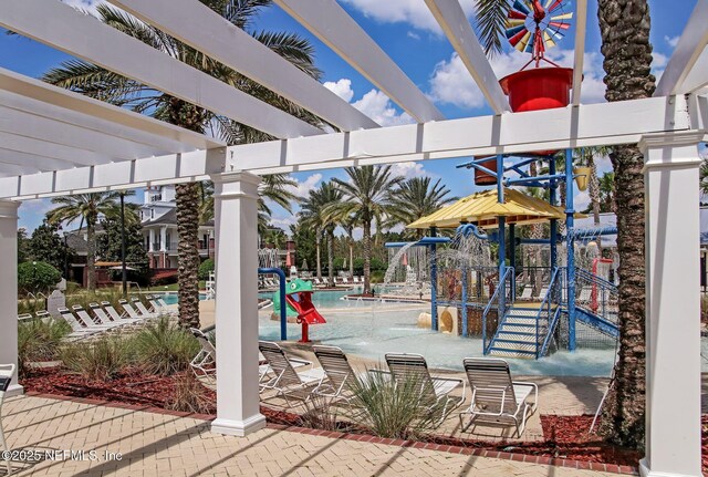 3353 Horseshoe Trail Dr, Orange Park, FL 32065 - view of patio featuring a water play area, a pergola, and a community pool