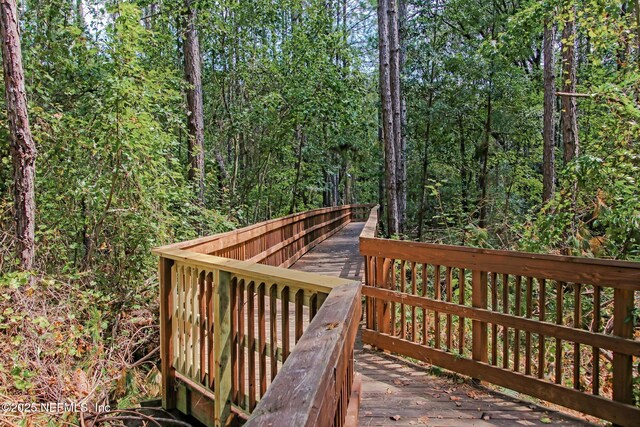 3353 Horseshoe Trail Dr, Orange Park, FL 32065 - wooden terrace featuring a wooded view