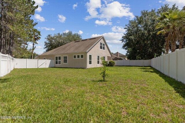 3353 Horseshoe Trail Dr, Orange Park, FL 32065 - rear view of house featuring stucco siding