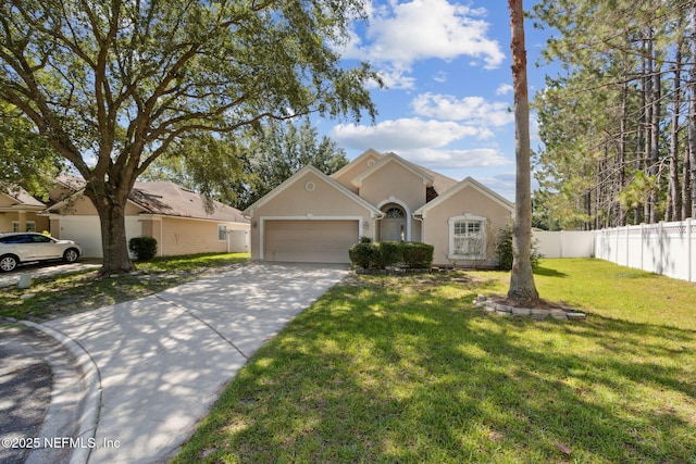 3353 Horseshoe Trail Dr, Orange Park, FL 32065 - view of front of home with a garage, concrete driveway, and stucco siding