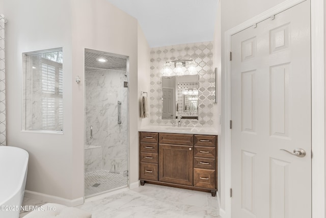 1758 Country Walk Dr, Fleming Island, FL 32003 - bathroom featuring marble look tile flooring, a marble finish shower, a soaking tub, and vanity