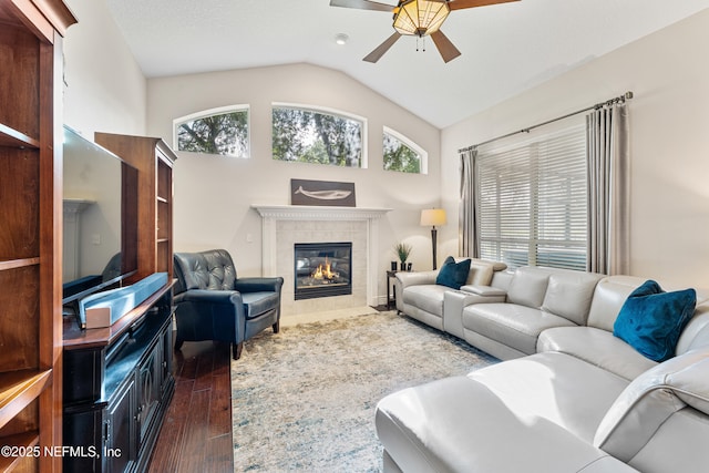 1758 Country Walk Dr, Fleming Island, FL 32003 - living room featuring dark wood finished floors, ceiling fan, lofted ceiling, and a fireplace