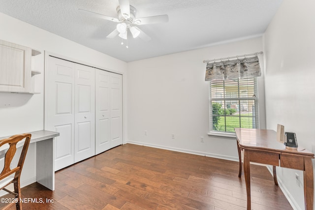 1758 Country Walk Dr, Fleming Island, FL 32003 - office space featuring ceiling fan, dark wood-style floors, and a textured ceiling