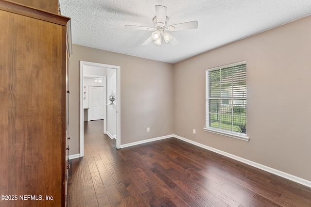 1758 Country Walk Dr, Fleming Island, FL 32003 - empty room featuring dark wood-type flooring, a ceiling fan, and a textured ceiling