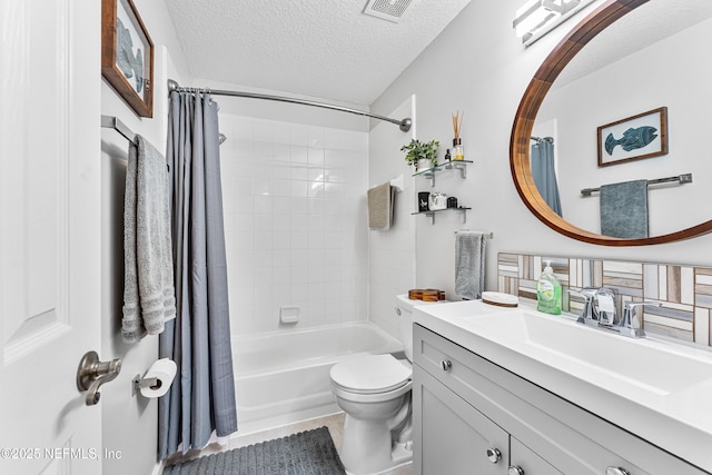 1758 Country Walk Dr, Fleming Island, FL 32003 - bathroom featuring a textured ceiling, vanity, and shower / bath combo
