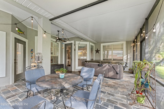 1758 Country Walk Dr, Fleming Island, FL 32003 - sunroom with outdoor dining area, brick patterned flooring, a hot tub, and ceiling fan