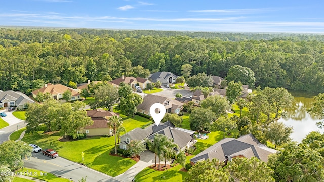 1758 Country Walk Dr, Fleming Island, FL 32003 - aerial view of residential area with a forest and a large body of water