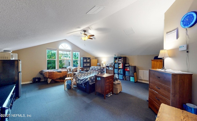 1700 Waters Edge Dr, Fleming Island, FL 32003 - bedroom featuring freestanding refrigerator, vaulted ceiling, a ceiling fan, and baseboards