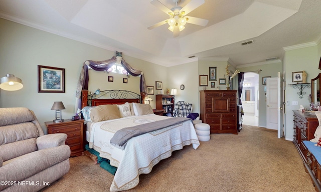 1700 Waters Edge Dr, Fleming Island, FL 32003 - carpeted bedroom with a raised ceiling, crown molding, ensuite bath, and a ceiling fan