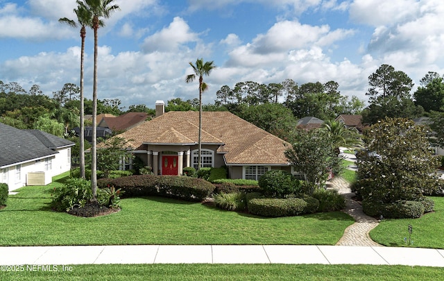 1700 Waters Edge Dr, Fleming Island, FL 32003 - view of front of home with a front yard