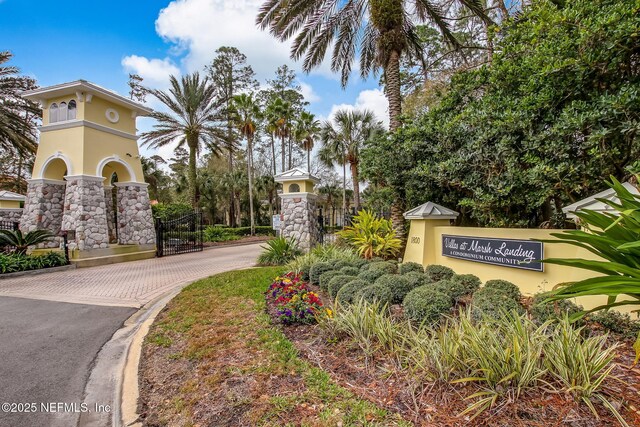 1800 The Greens Way Unit 1907, Jacksonville Beach, FL 32250 - community sign with driveway
