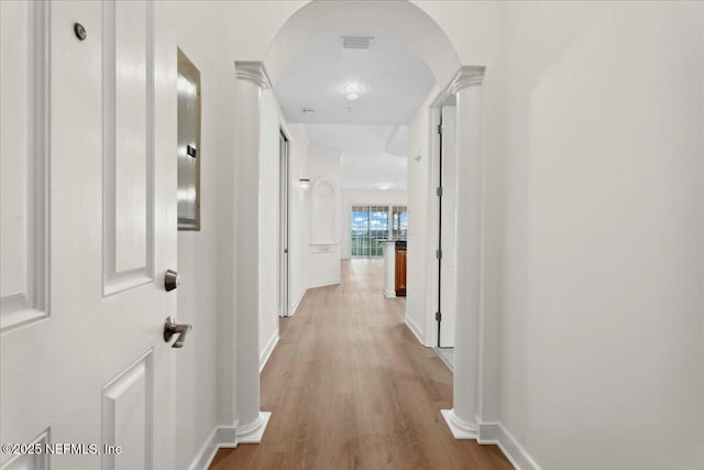 150 Pantano Cay Blvd Unit 2303, Saint Augustine, FL 32080 - corridor with wood finished floors and arched walkways