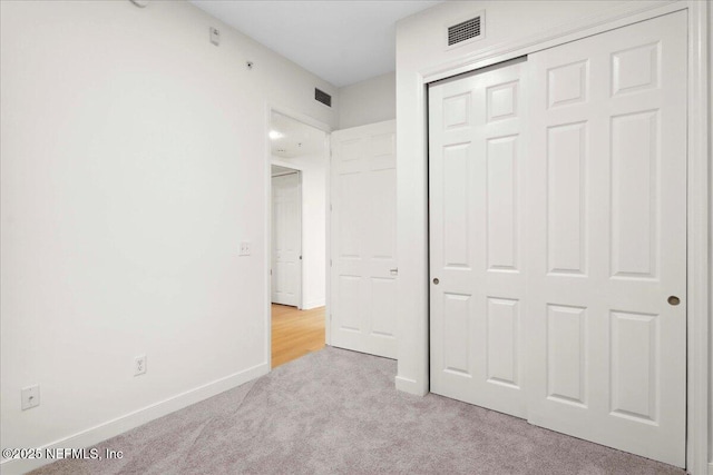 150 Pantano Cay Blvd Unit 2303, Saint Augustine, FL 32080 - unfurnished bedroom featuring carpet flooring and a closet
