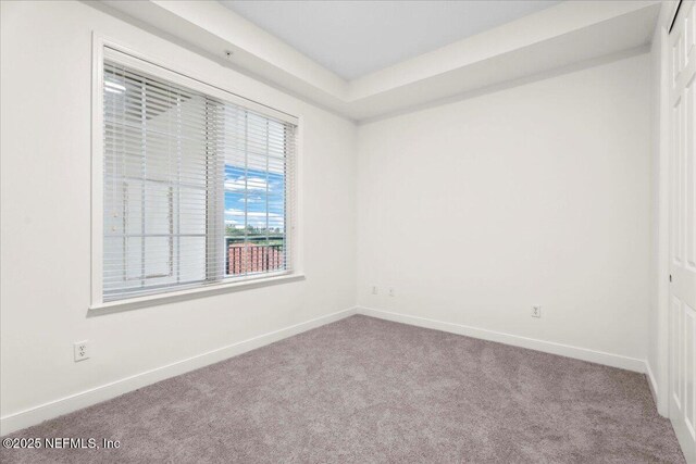 150 Pantano Cay Blvd Unit 2303, Saint Augustine, FL 32080 - carpeted empty room with baseboards
