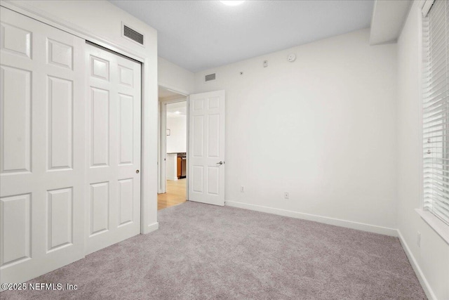 150 Pantano Cay Blvd Unit 2303, Saint Augustine, FL 32080 - unfurnished bedroom with carpet flooring and a closet
