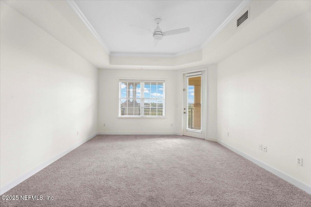 150 Pantano Cay Blvd Unit 2303, Saint Augustine, FL 32080 - unfurnished room featuring ornamental molding, ceiling fan, light colored carpet, and a raised ceiling