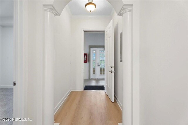 150 Pantano Cay Blvd Unit 2303, Saint Augustine, FL 32080 - hall featuring light wood-style flooring, ornamental molding, and arched walkways