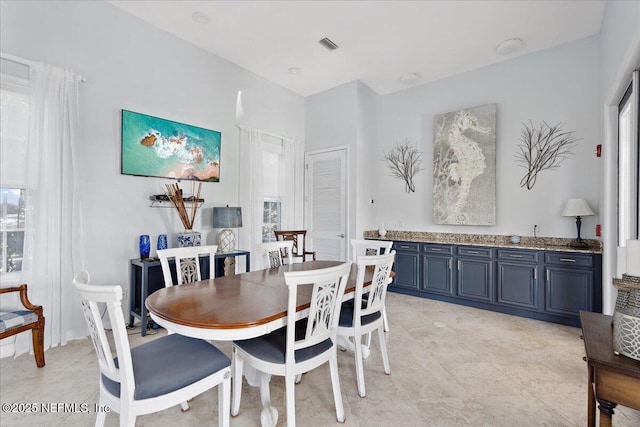 150 Pantano Cay Blvd Unit 2303, Saint Augustine, FL 32080 - dining area with healthy amount of natural light and light tile patterned floors