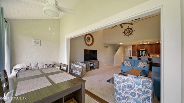 87 Village Del Lago Cir, Saint Augustine, FL 32080 - dining room with stairway, high vaulted ceiling, beamed ceiling, and a textured wall