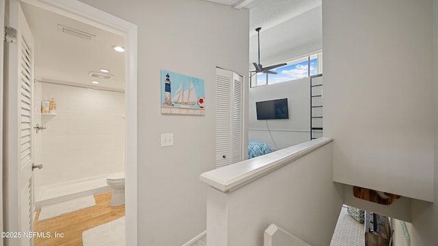 87 Village Del Lago Cir, Saint Augustine, FL 32080 - hall with wood finished floors and an upstairs landing