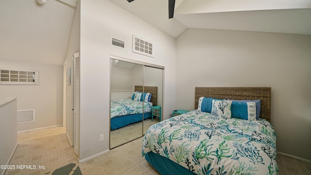 87 Village Del Lago Cir, Saint Augustine, FL 32080 - bedroom featuring lofted ceiling, carpet flooring, a closet, baseboards, and a ceiling fan