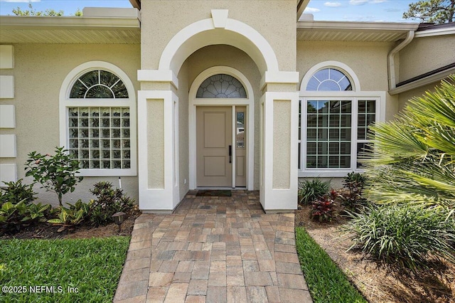 6541 Burnham Cir, Ponte Vedra Beach, FL 32082 - view of exterior entry with stucco siding