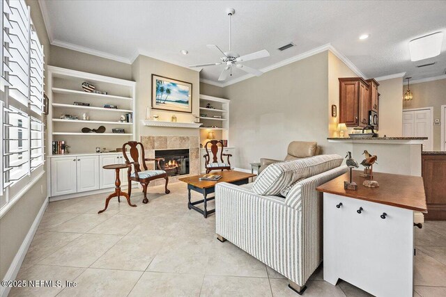 6541 Burnham Cir, Ponte Vedra Beach, FL 32082 - living room featuring ceiling fan, a fireplace, crown molding, baseboards, and recessed lighting