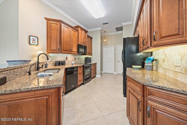 6541 Burnham Cir, Ponte Vedra Beach, FL 32082 - kitchen with black appliances, a sink, brown cabinets, a peninsula, and tasteful backsplash