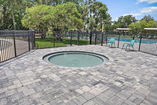 6541 Burnham Cir, Ponte Vedra Beach, FL 32082 - community pool featuring a patio