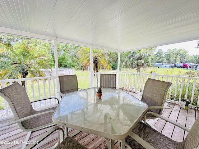 417 2nd Ave, Satsuma, FL 32189 - deck featuring outdoor dining space and a lawn