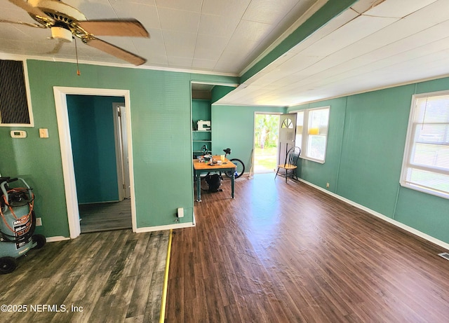 8726 6th Ave, Jacksonville, FL 32208 - empty room featuring wood finished floors, a ceiling fan, ornamental molding, and baseboards