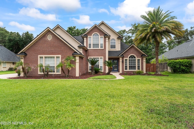 1321 Honeysuckle Dr, Saint Johns, FL 32259 - traditional-style home featuring brick siding and a shingled roof