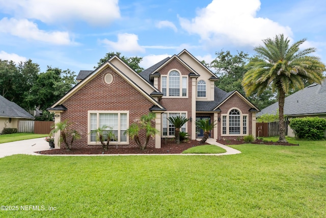 1321 Honeysuckle Dr, Saint Johns, FL 32259 - traditional-style house with brick siding and a shingled roof