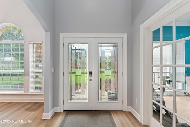 1321 Honeysuckle Dr, Saint Johns, FL 32259 - doorway to outside featuring french doors, wood finished floors, and plenty of natural light
