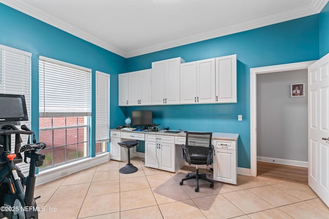 1321 Honeysuckle Dr, Saint Johns, FL 32259 - office area featuring built in desk, crown molding, light tile patterned floors, and baseboards