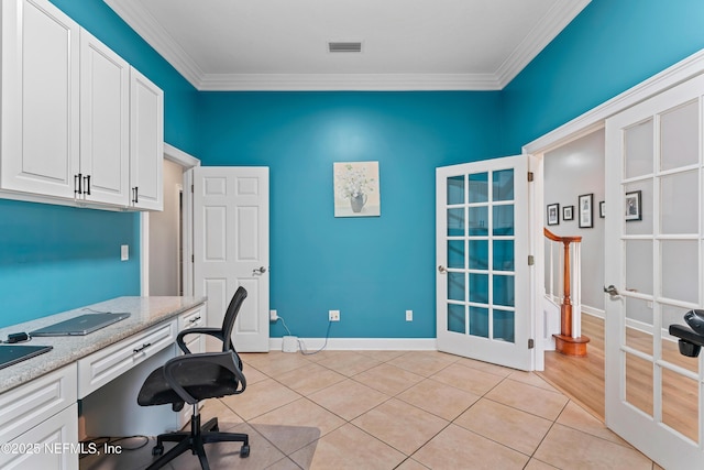 1321 Honeysuckle Dr, Saint Johns, FL 32259 - home office with crown molding, light tile patterned floors, built in study area, and baseboards