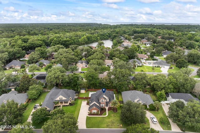 1321 Honeysuckle Dr, Saint Johns, FL 32259 - aerial perspective of suburban area featuring a heavily wooded area and a nearby body of water