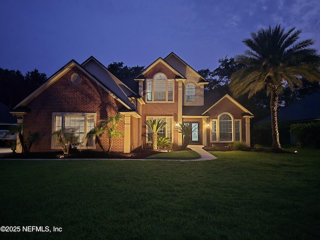 1321 Honeysuckle Dr, Saint Johns, FL 32259 - view of front of property featuring a front yard and brick siding