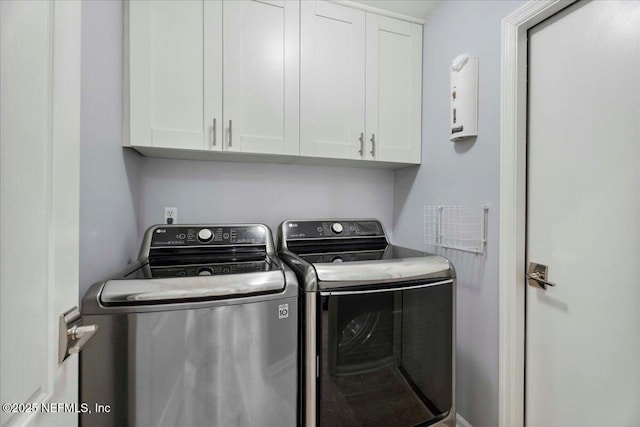 8681 Canopy Oaks Dr, Jacksonville, FL 32256 - laundry room with washer and dryer and cabinet space