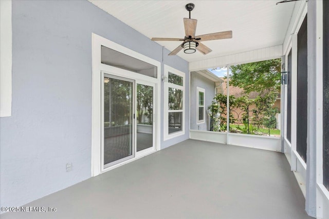 8681 Canopy Oaks Dr, Jacksonville, FL 32256 - unfurnished sunroom featuring concrete flooring